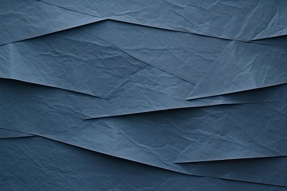 Folded blue paper texture paper backgrounds textured abstract.
