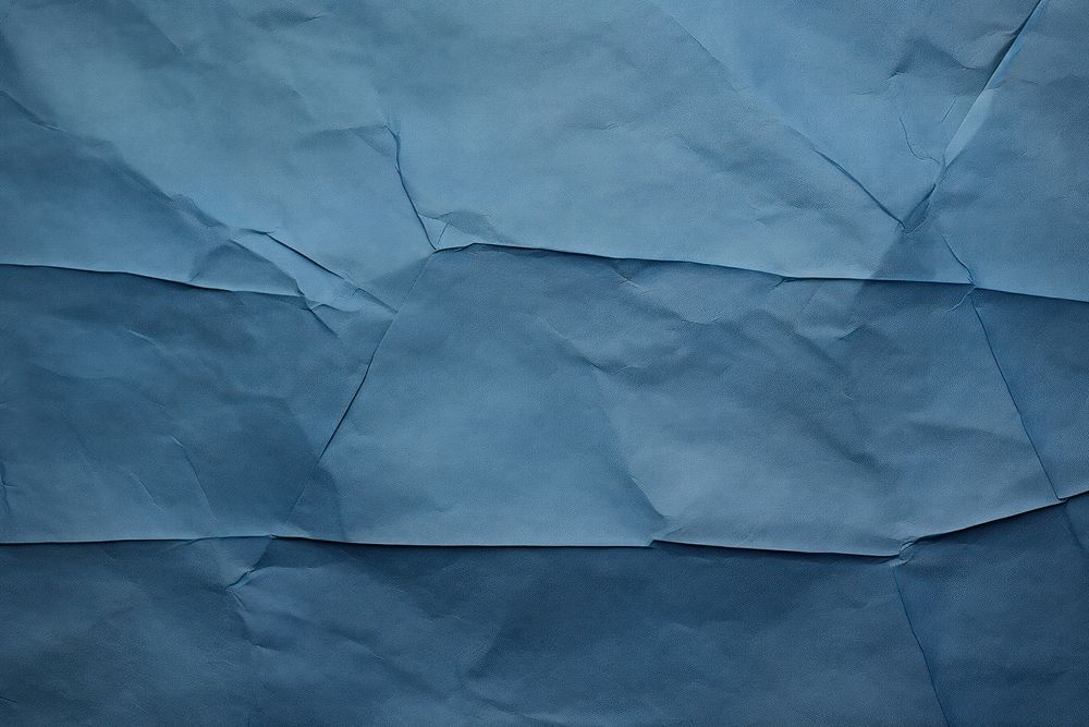 Folded blue paper texture paper backgrounds textured abstract.