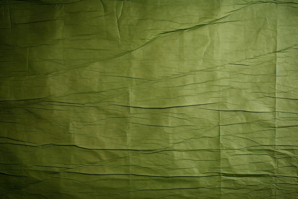 Folded green paper texture paper backgrounds linen textured.