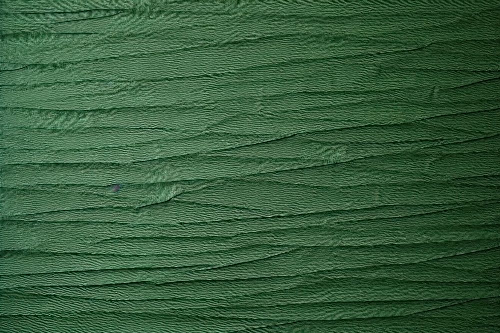 Folded green paper texture paper backgrounds leaf textured.