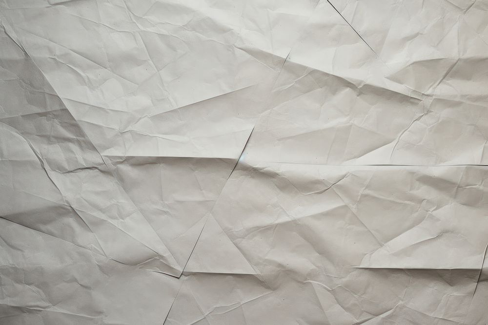 Folded grey paper texture paper backgrounds crumpled textured.