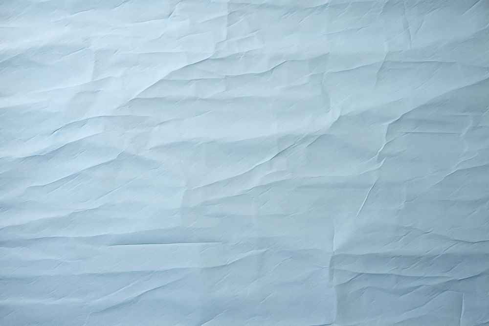 Folded light blue paper texture paper backgrounds textured abstract.