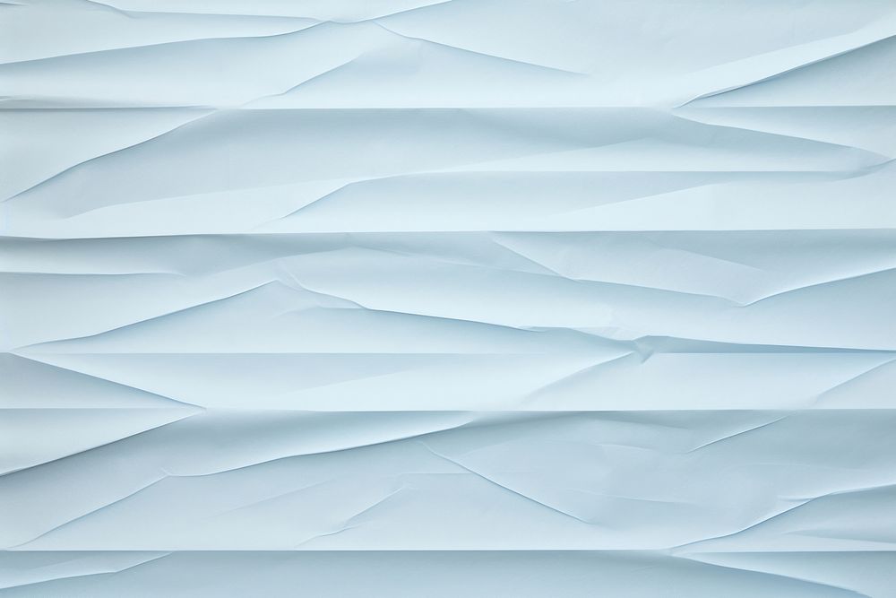 Folded light blue paper texture paper.