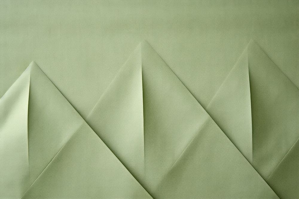 Folded light green paper texture paper backgrounds simplicity creativity.