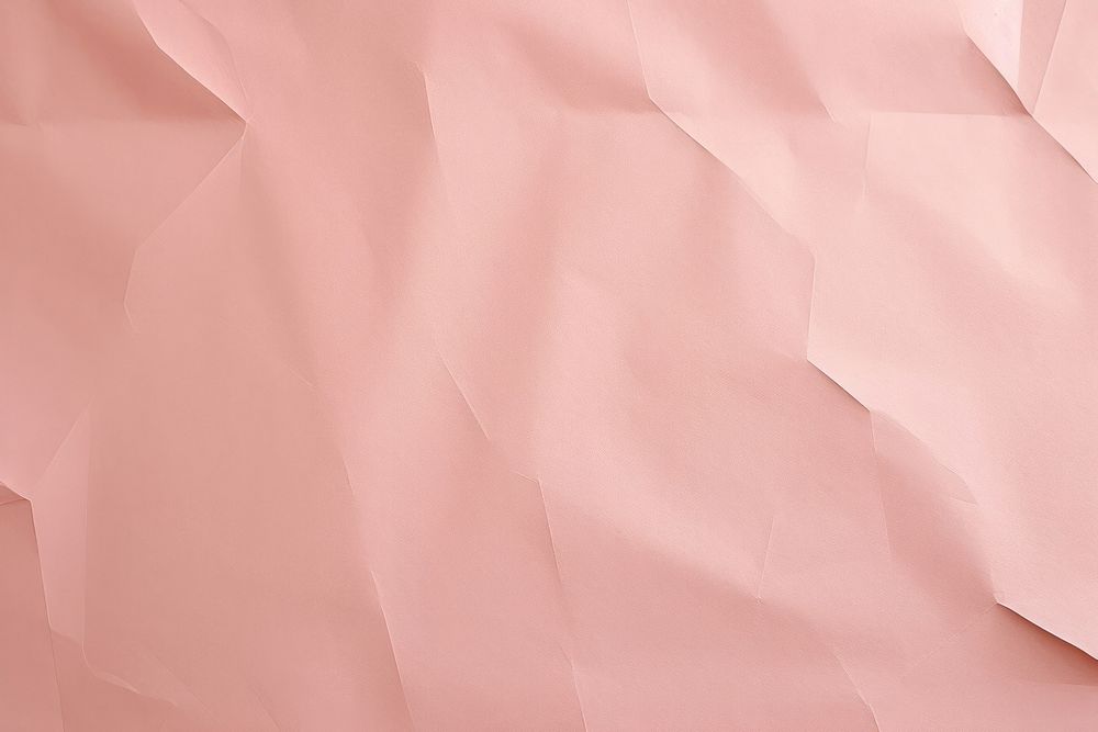 Folded pink peach paper texture paper backgrounds crumpled textured.