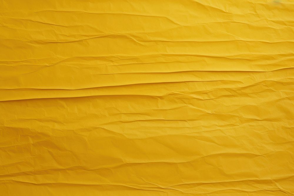 Folded yellow paper texture paper backgrounds textured abstract.