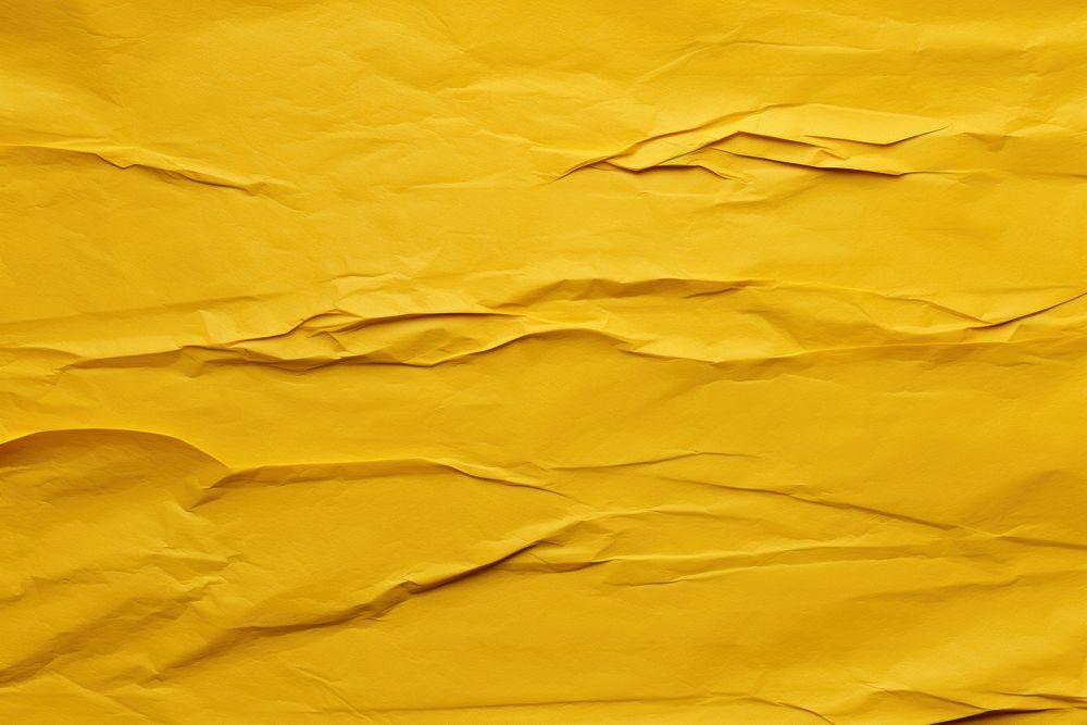 Folded yellow paper texture paper backgrounds parchment textured.