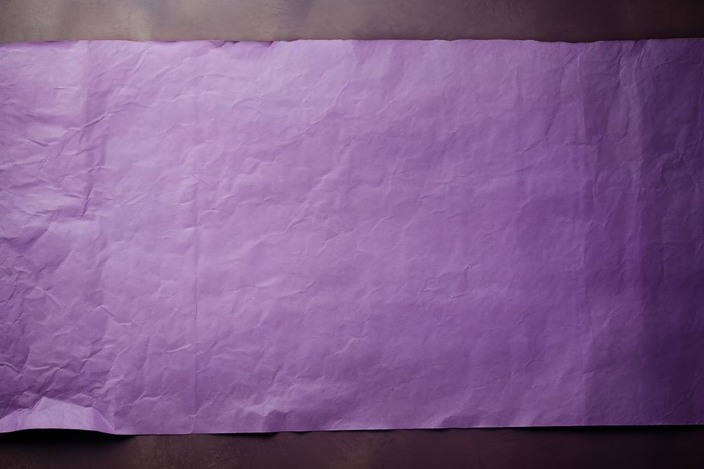 Purple paper backgrounds crumpled wrinkled.