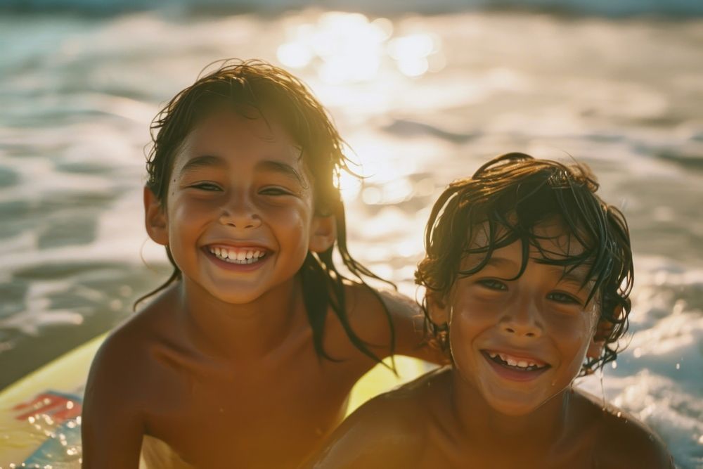 Two diversity cool kids surfing smile photography swimming.