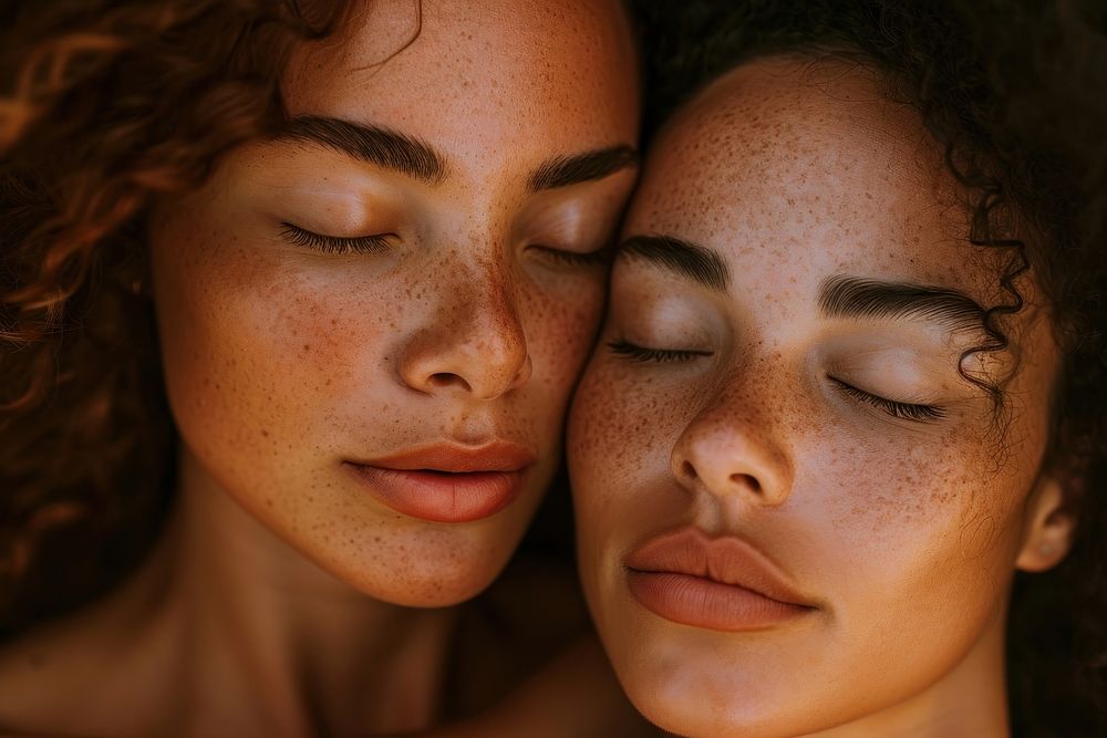 2 women closing their eyes skin photography portrait.
