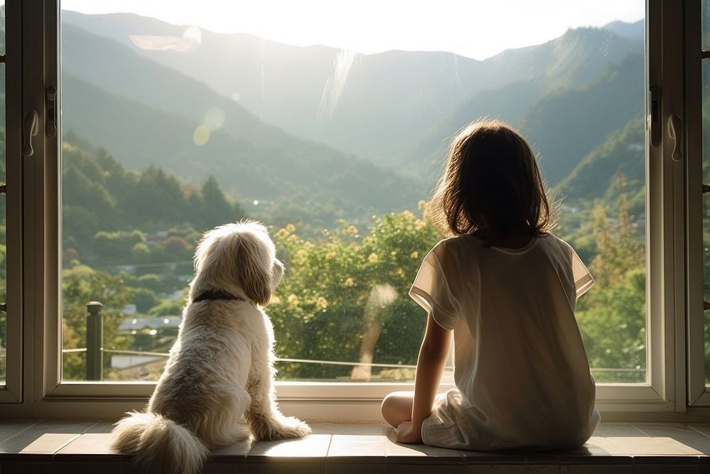 The window view with a girls and a dog looking out sitting mammal animal.