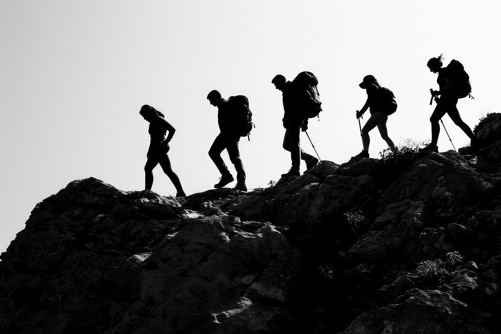 Silhouette Black and white people hiking recreation adventure outdoors.