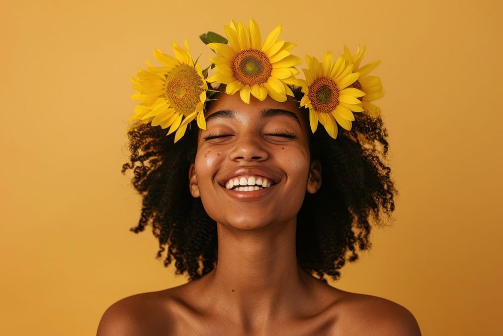 Young african american woman sunflower laughing portrait.