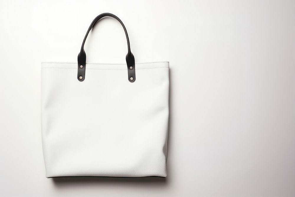 White drawsrting bag open handbag purse white background.