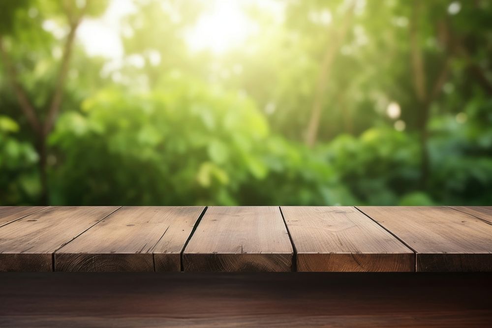 Wooden table with blur green nature background backgrounds sunlight hardwood. AI generated Image by rawpixel.