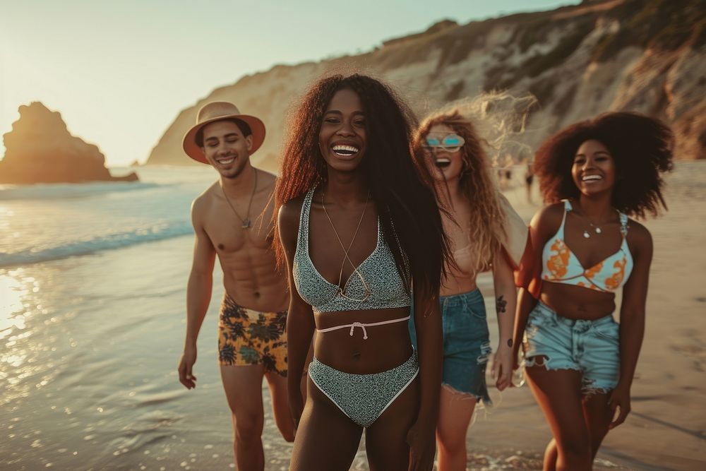 Happy black people group of friends laughing vacation beach.