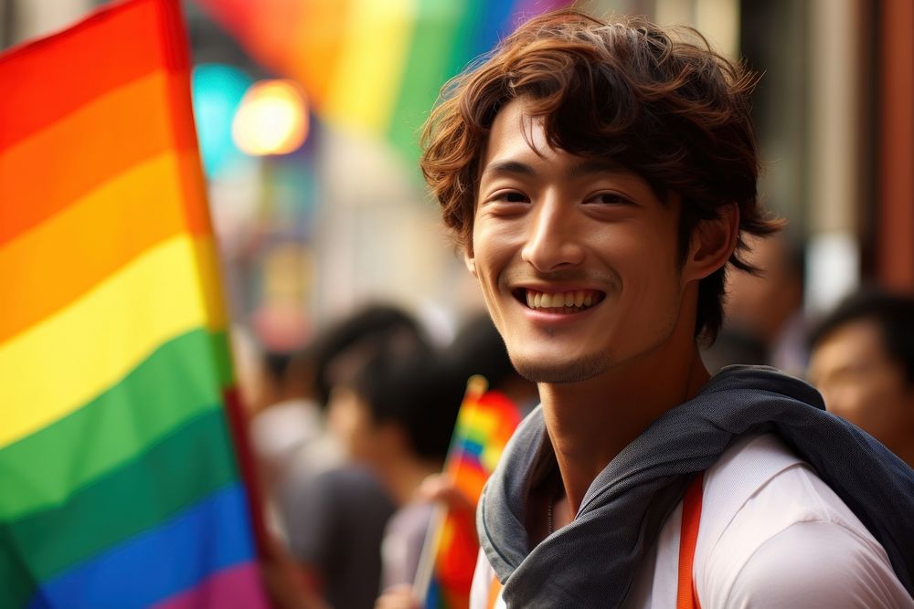 Japanese man flag smiling parade.