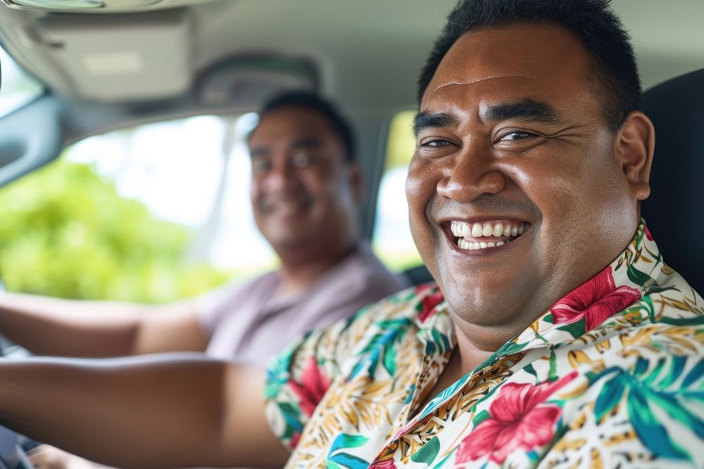 Samoan friends laughing portrait driving.