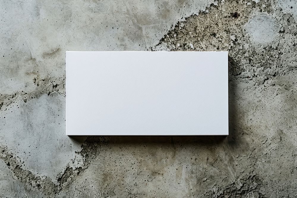 Business card paper white wall.