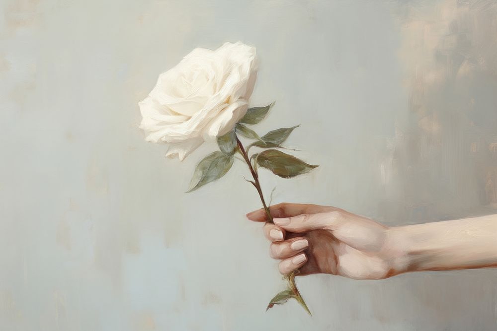 Hand holding white rose painting flower plant.