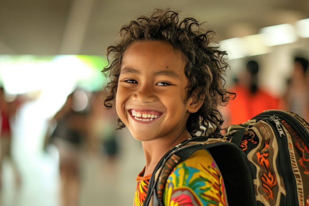 Happy Samoan kids portrait laughing backpack.