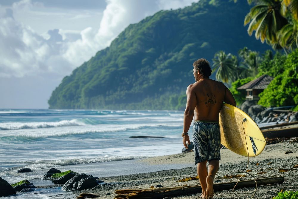 A Samoan man holding surf board outdoors surfing nature.