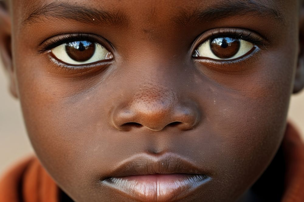 African kid skin homelessness portrait.