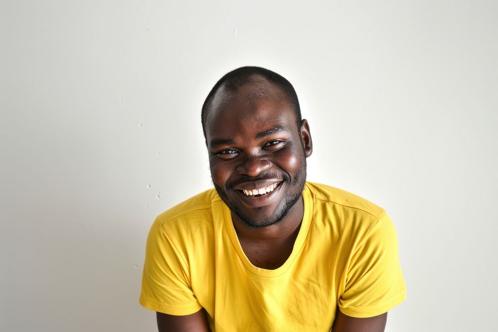 African man smile portrait t-shirt yellow.