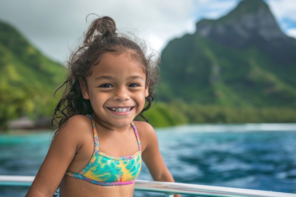 Happy samoan diver young girl swimming sea portrait.