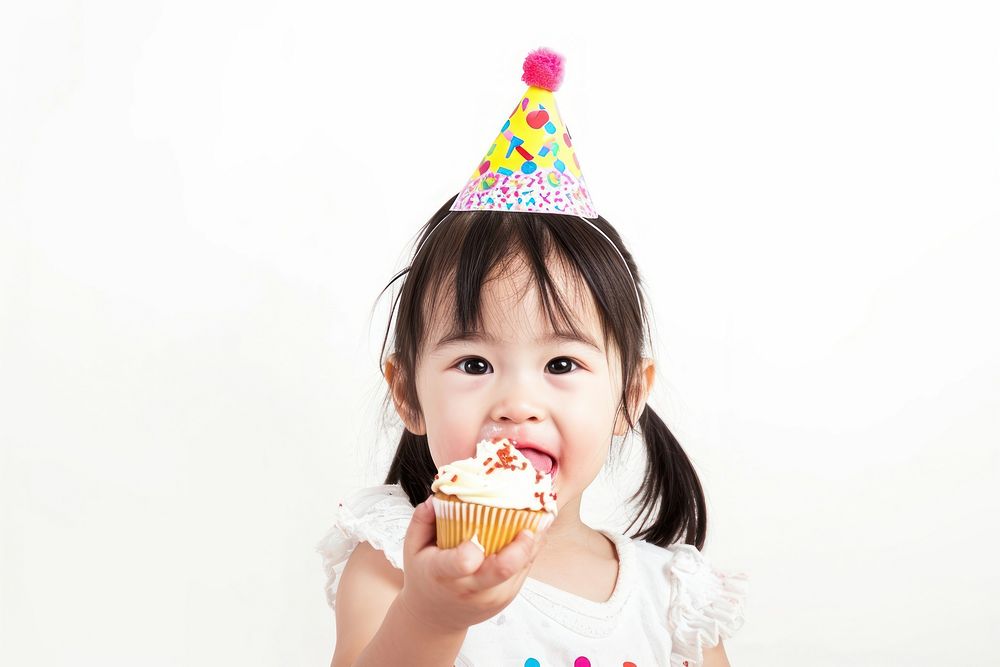 Asia girl eatting cupcake birthday portrait food.