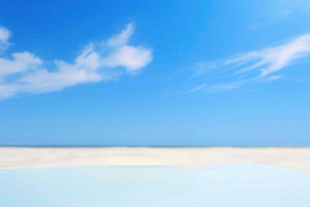 Sand and blue sky backgrounds outdoors horizon.
