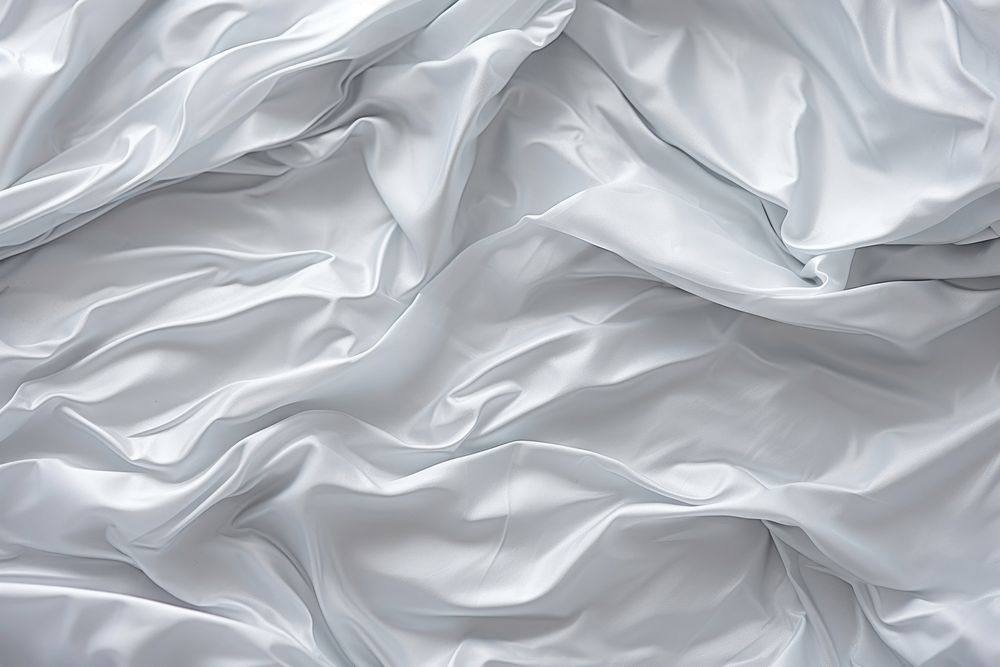 Crinkled plastic texture background backgrounds silk crumpled. AI generated Image by rawpixel.