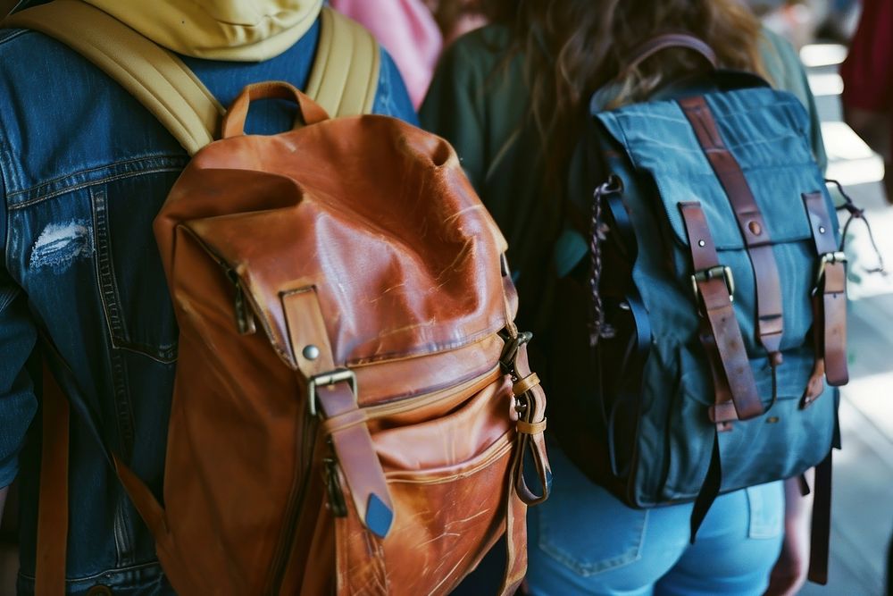 Friends holding backpack handbag luggage togetherness.
