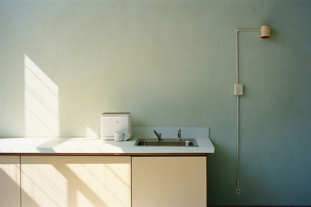 A minimal kitchen furniture sink architecture.