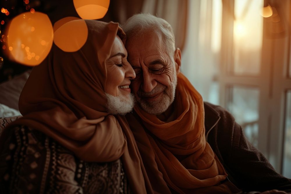 Senior Middle eastern couple taking care each other portrait smiling adult.
