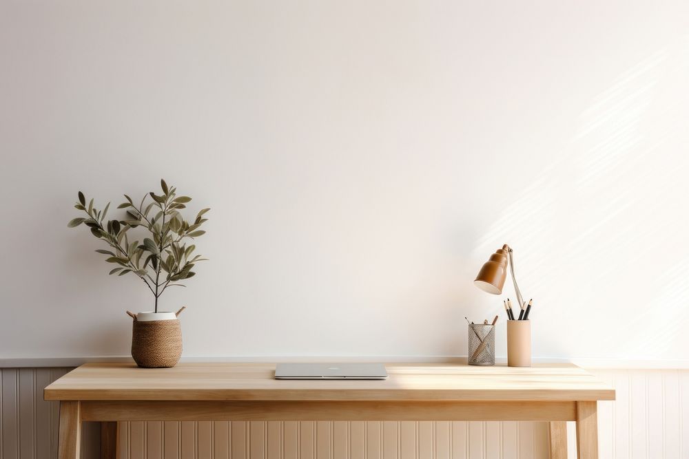 A cozy working room wall furniture table.