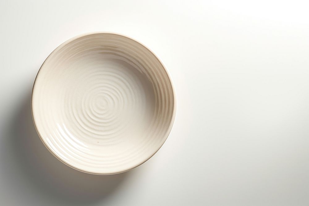A minimal off-white dish porcelain pottery bowl.