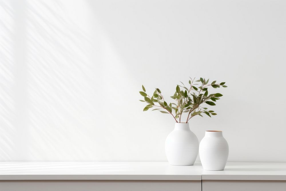 Windowsill plant white vase.
