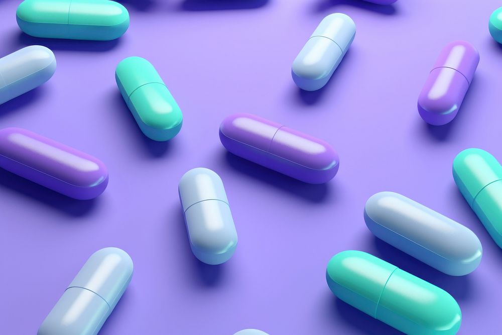 Pills and capsules purple green blue.