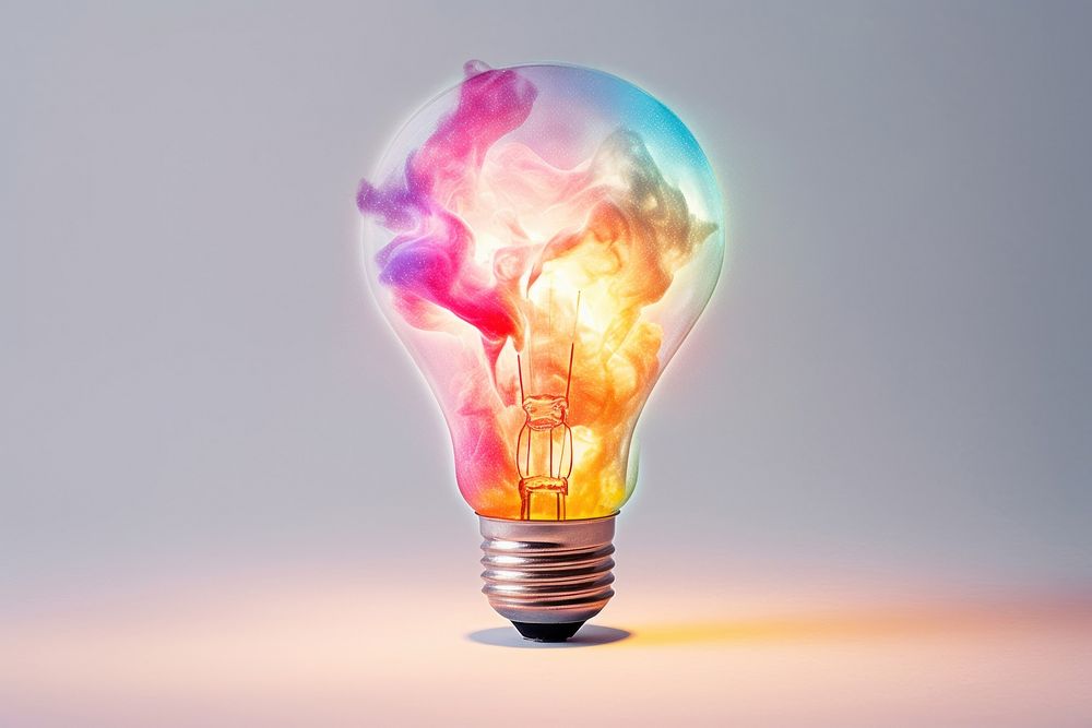 Light bulb with Colored powder explosion lightbulb innovation creativity.