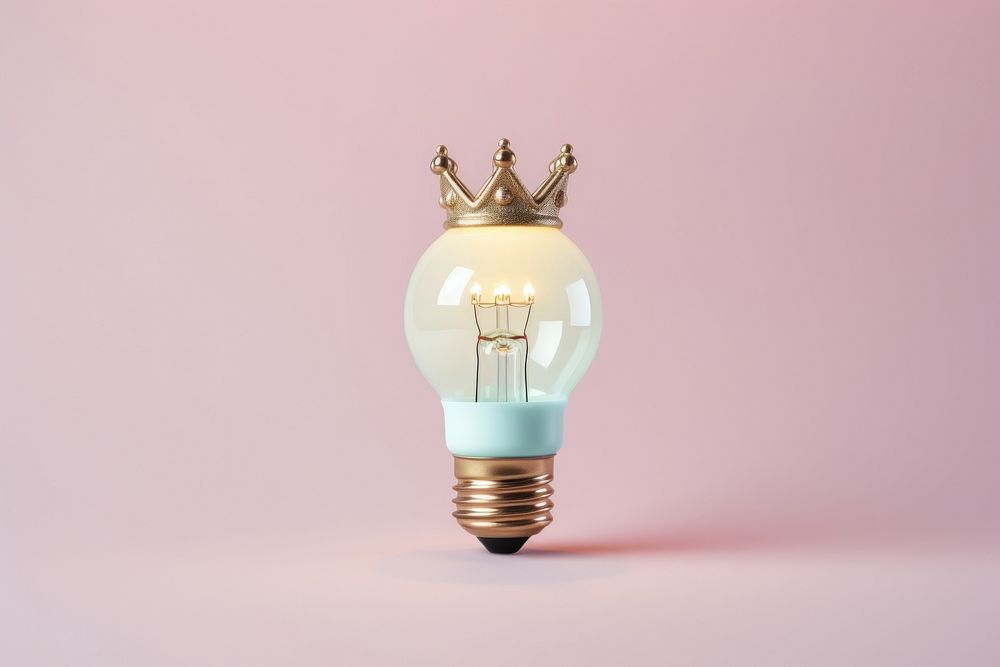 Light bulb with crown lightbulb innovation illuminated.