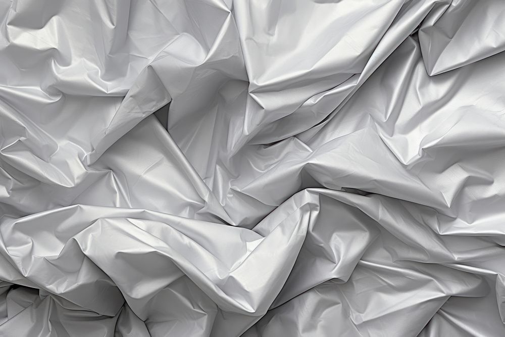 Light gray color crumpled plastic texture background backgrounds wrinkled textured. AI generated Image by rawpixel.