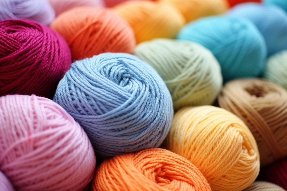 Colorful yarn wool backgrounds creativity. AI generated Image by rawpixel.