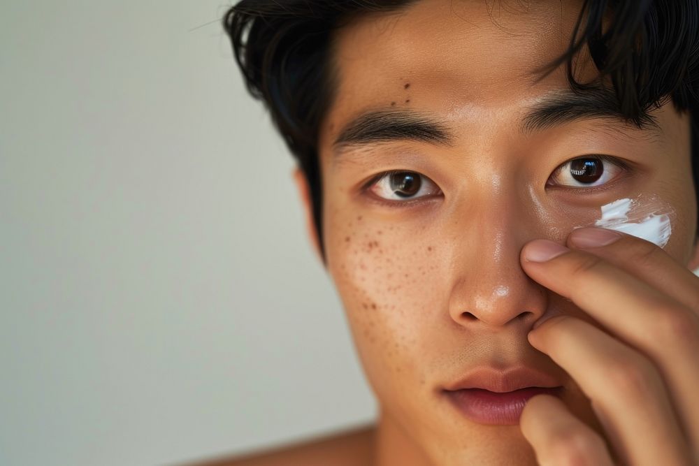 Korean man skin cosmetics forehead.