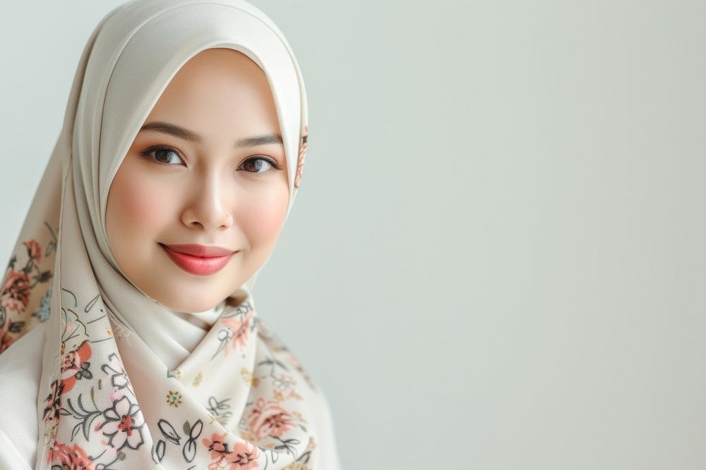 A Malaysian woman portrait scarf smile.
