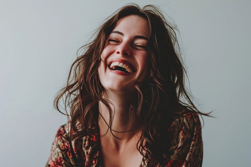 Brunette woman laughing smile adult happiness. AI generated Image by rawpixel.