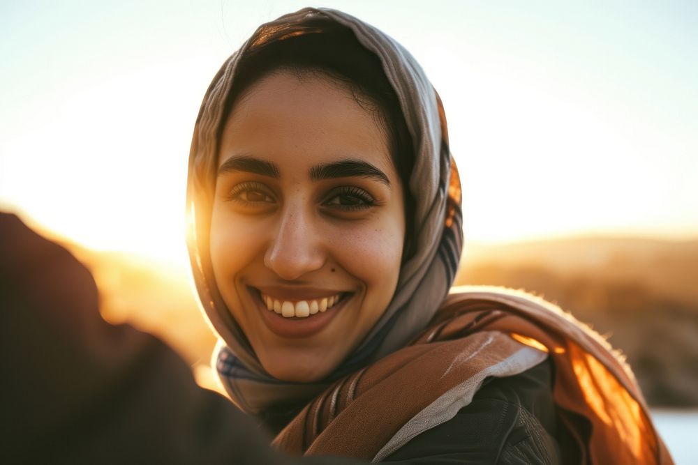 Young smiling middle eastern woman with scarf portrait adult smile.