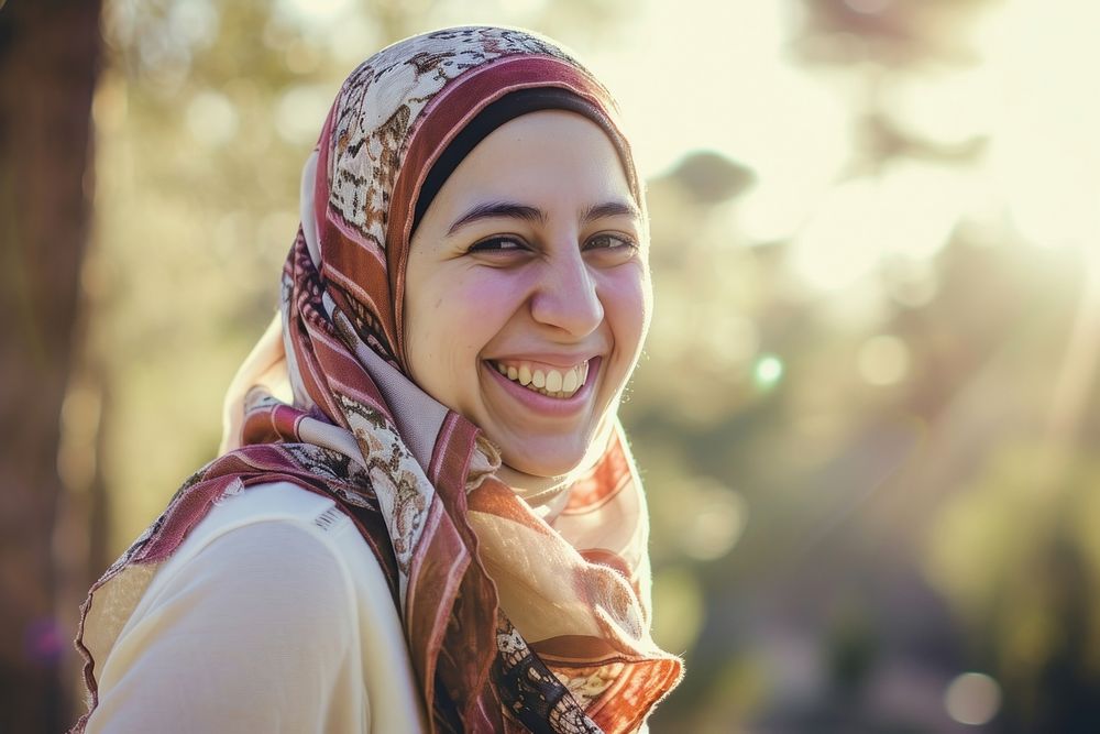 Young smiling middle eastern woman with scarf smile happy happiness.