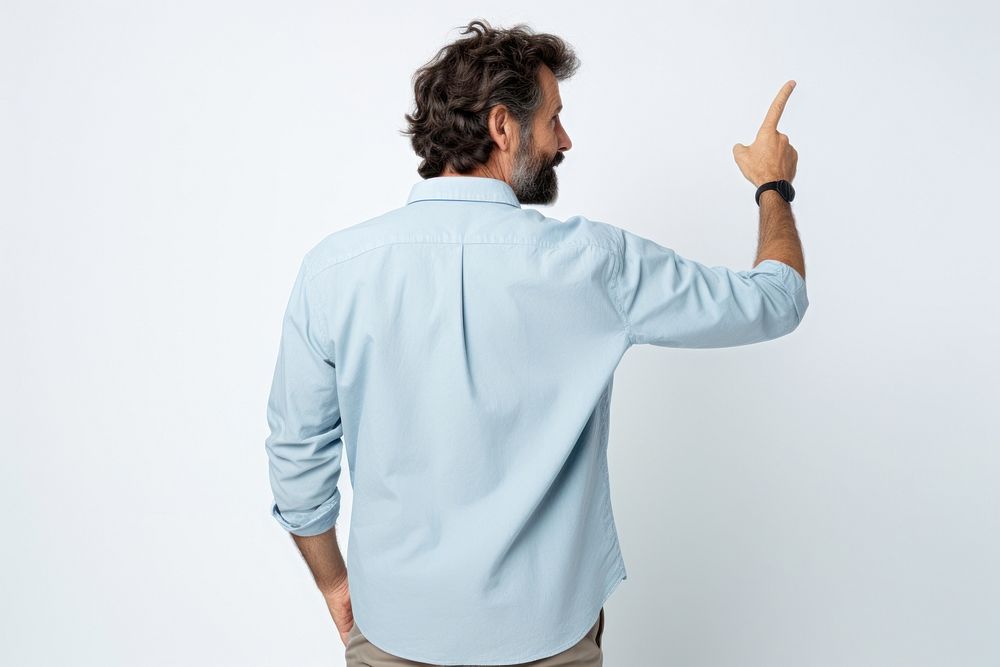 Man pointing to the back sleeve finger shirt.