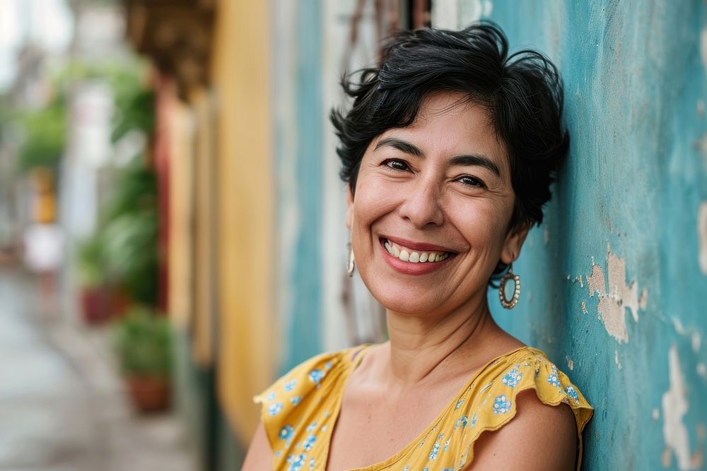 Middle aged hispanic woman smiling cheerful adult smile. AI generated Image by rawpixel.